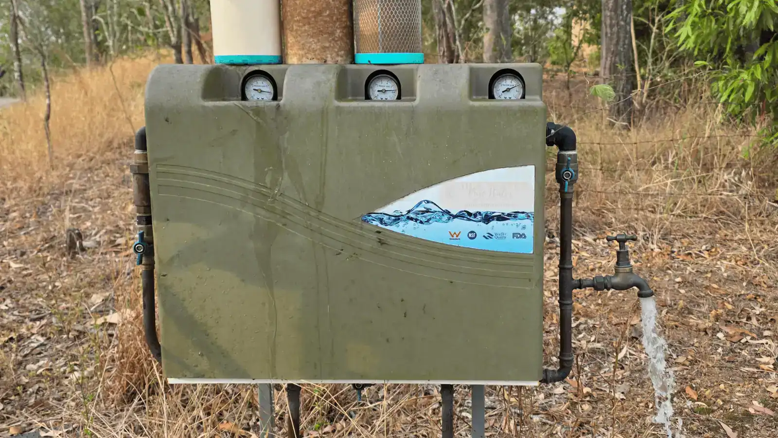 Older ageing plastic cover on water filtration unit showing outdoor wear